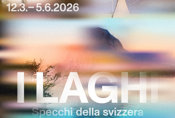 Uno sfondo sfocato con una montagna, un lago e una città